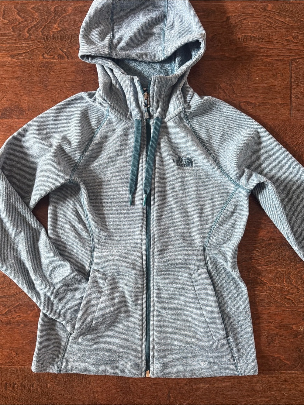 The North Face Women's Heathered Light Blue Hooded Teddy Fleece Jacket